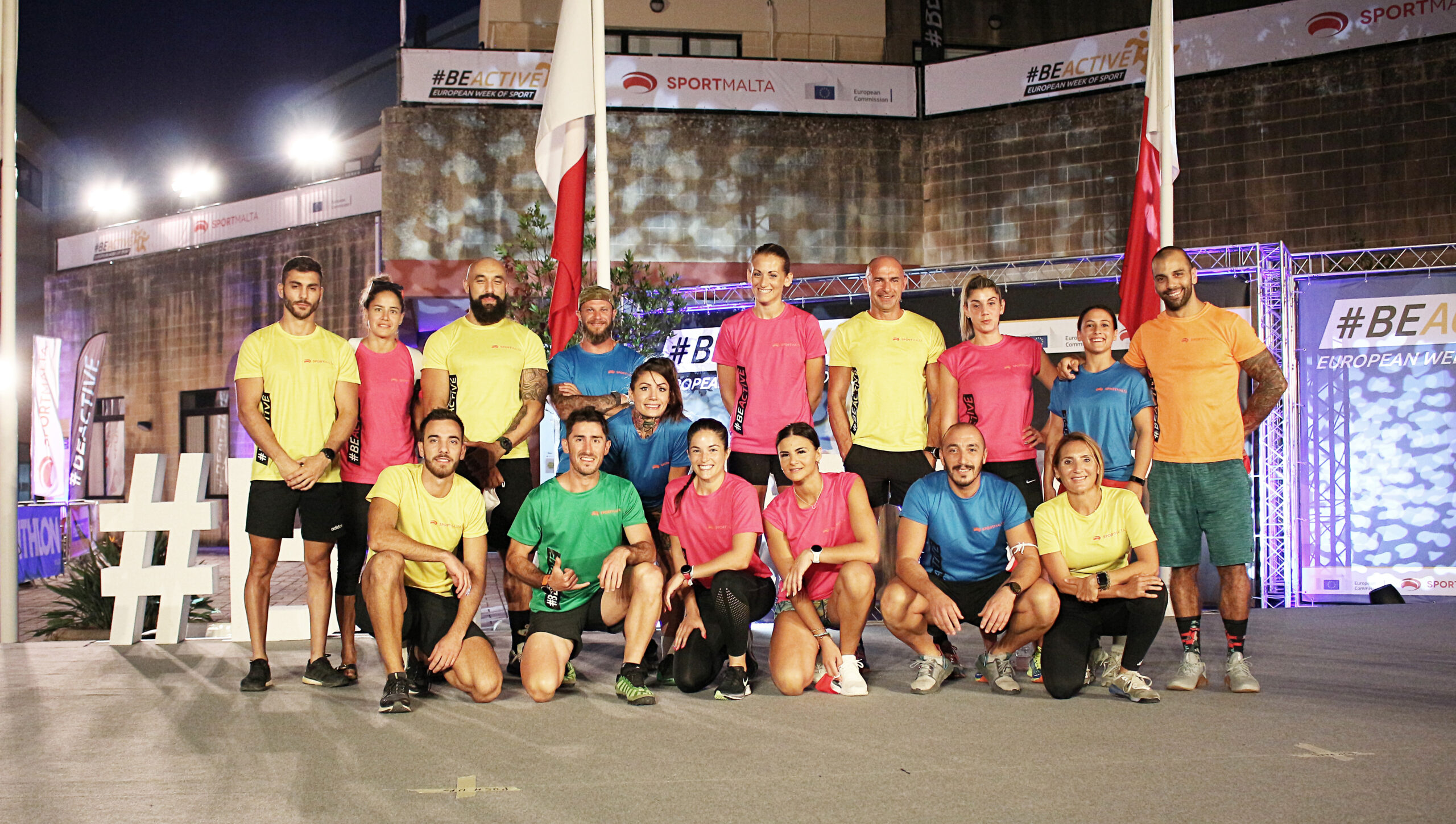Athletes with Sportmalta promotional training gear posing for a photo together in Be Active campaign
