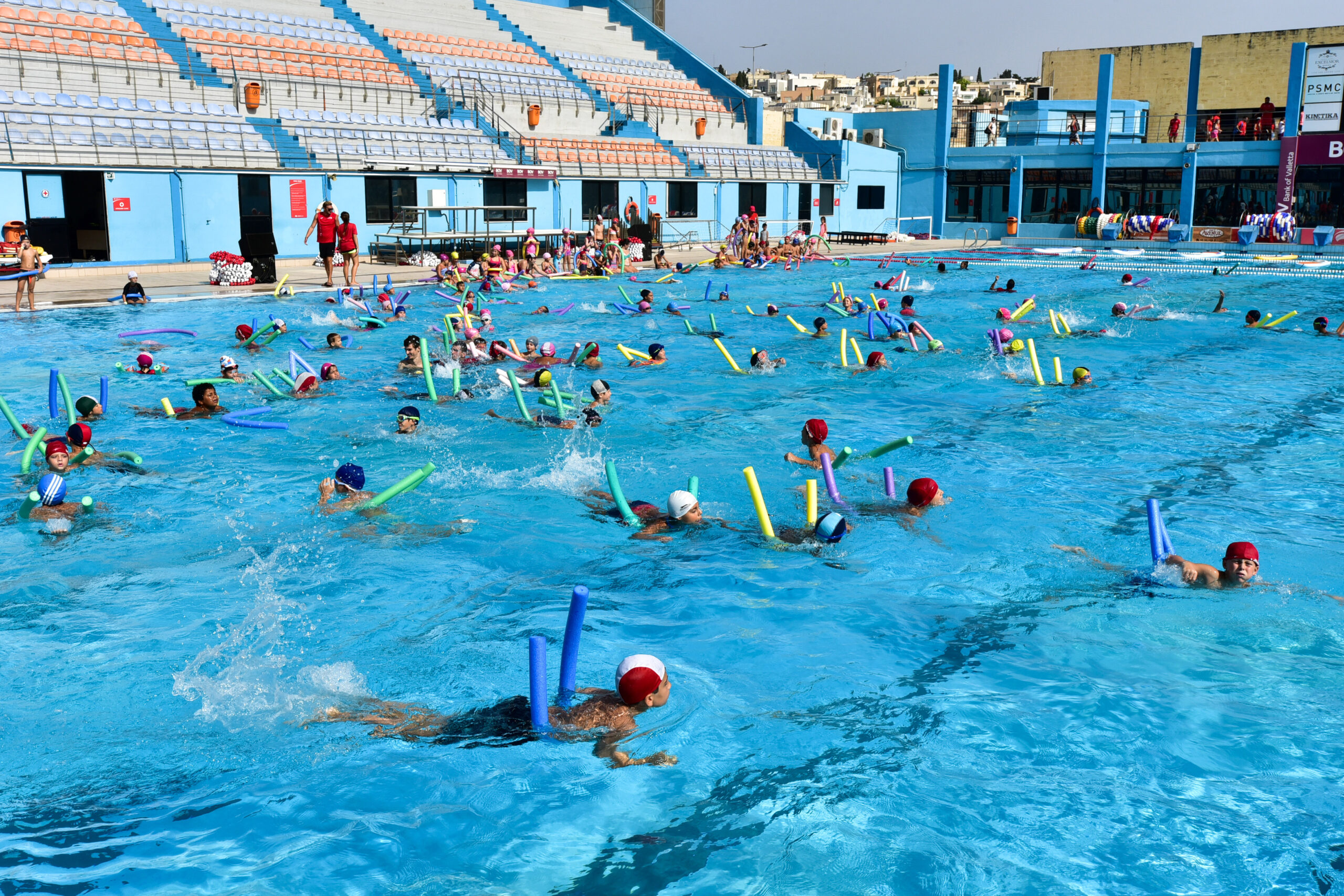 Children swimming activity at the National Pool Complex